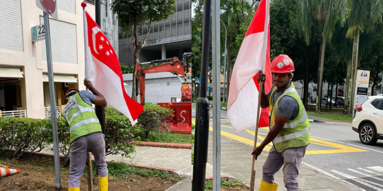 “Just doing my duty, Madam” – Migrant Worker fixes fallen Singapore Flag at Haig Road