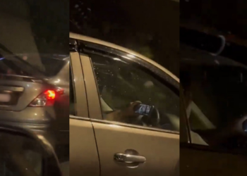 Woman Caught Watching Video While Driving With One Hand on the Wheel