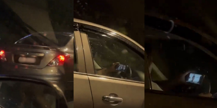 Woman Caught Watching Video While Driving With One Hand on the Wheel