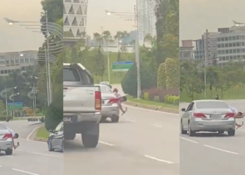 Man Hangs Out of Moving Car Window to Film Video, Sparks Safety Concerns