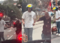Young Man Helps Elderly Woman Cross Road and Carry Her Trolley, Winning Hearts Online