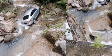 Car Slides Off Wet Road Into Rocky Streambed; Driver Fortunately Survives