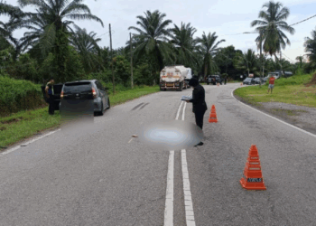 Woman Falls Out of Car After Door Opens Mid-Turn, Killed by Oncoming Oil Tanker