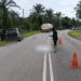 Woman Falls Out of Car After Door Opens Mid-Turn, Killed by Oncoming Oil Tanker