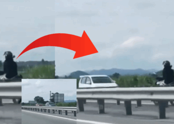 Woman Seen Riding Motorcycle Against Traffic on the North-South Expressway