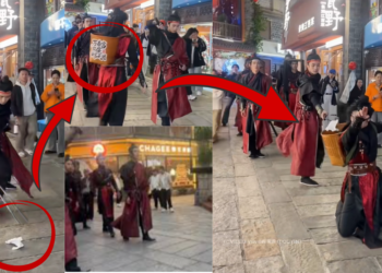 Imperial Guards with Swords Are Cleaning Streets in a Chinese Tourist Area