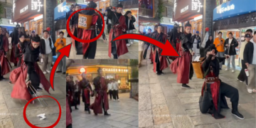 Imperial Guards with Swords Are Cleaning Streets in a Chinese Tourist Area