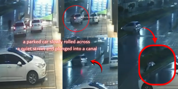 Car Rolls Into Canal After Driver Walks Away From Parked Vehicle