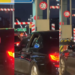 Polite Passenger Uses Heart Gestures To Cut Into Toll Line Smoothly