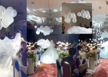 A Moment for the Bride: Balloons Hold Up Veil in Ethereal Bridal Display