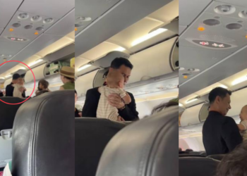 Cabin Crew Comforts Crying Baby And Turns Stressful Flight Into Viral Moment