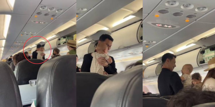 Cabin Crew Comforts Crying Baby And Turns Stressful Flight Into Viral Moment
