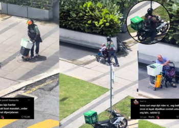 Kind Malaysian Grab Delivery Rider Stops Work to Help Elderly Man in Wheelchair