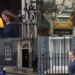 Starmer departs Downing Street for King’s Speech amid mounting pressure to quit