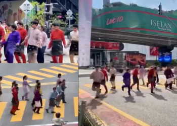 A Malaysian dance group performed Michael Jackson’s moonwalk while wearing traditional cultural attire