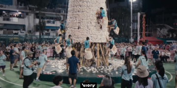 Bun-believable tower! Cheung Chau festival thrills thousands with iconic bun scramble