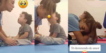 Heartfelt Moment Captured: Child with Down Syndrome Kisses Therapist while She Helps Him Put Socks on