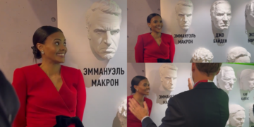 Candace Owens poses with busts including France’s Macron at SPIEF amid ongoing defamation suit