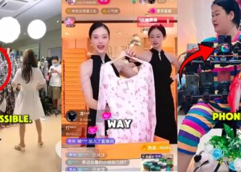 Chinese Livestream Host Manages Massive Wall Of Over One Hundred Phones To Boost Sales