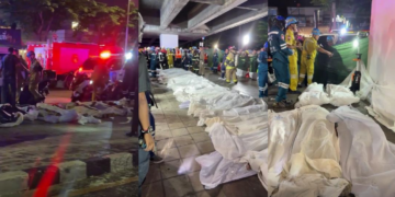 Rescuers recover victims from burned Bangkok bar