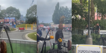 Three killed after gunfire rips through food festival as police hunt second suspect