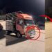 Tiny Myvi Pulls A Heavy Lorry Along The Road In Pahang
