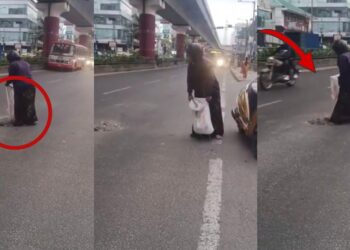 Woman Risks Busy Traffic To Fix Road Pothole Herself After Waiting For Authorities