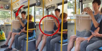 Chinese High Jumper Zhang Guowei Carries Giant Bubble Tea On Bus