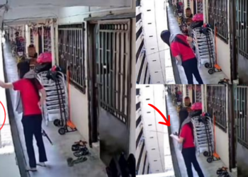 Forgot Something Again? Husband Waits Below, While Wife Sends It With A Fishing Rod