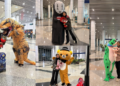 Husband Wears Creative Costumes To Surprise Wife During Every Airport Reunion