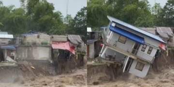 Two-storey residential building in Pampanga, Philippines crumbles as floodwaters sweep it away
