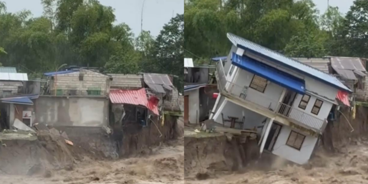 Two-storey residential building in Pampanga, Philippines crumbles as floodwaters sweep it away