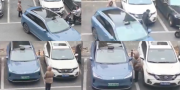 Woman Stands Guard For Parking Spot, Gets Outsmarted By Self-Parking Car
