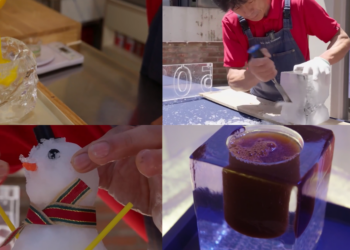 Visitors sip from ICE glasses as cafe offers escape from record-breaking summer heat