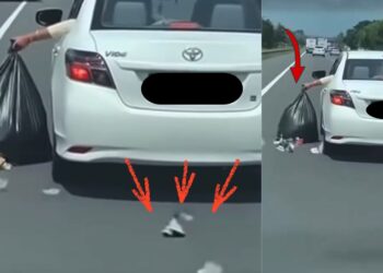 Car Driver Drags Garbage Bag Along Highway Spilling Trash Across Road