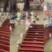 For WETTER or worse! – Philippines bride wades down flooded church aisle on wedding day